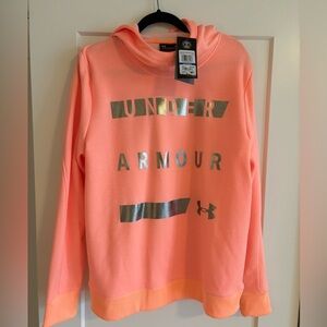 Ladies brand new Under Armour is orange sweatshirt.  With tags.